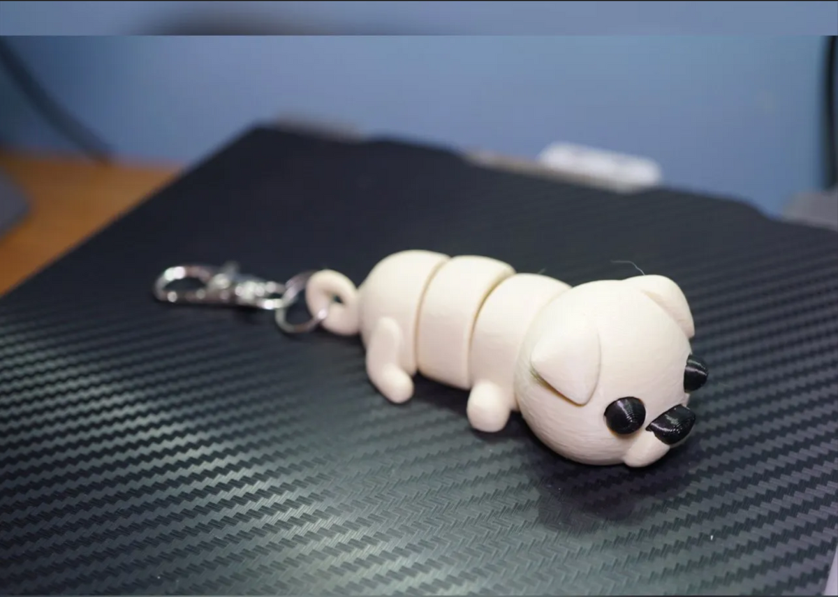 Flexi puppy Keychain